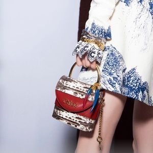 Small Aby Lock chain bag in embossed lizard effect